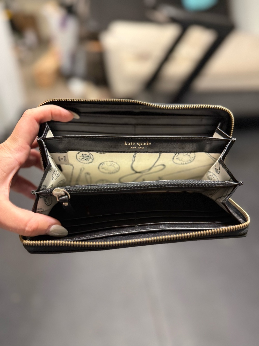kate spade Black Zip-Around Leather Wallet with Printed Interior